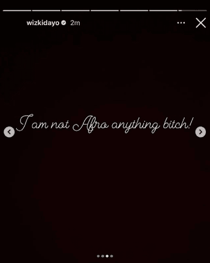 Screenshot of an Instagram story post made by Wizkid (@wizkidayo) showing the following text: “I am not Afro anything bitch!” in white cursive font on a black background.